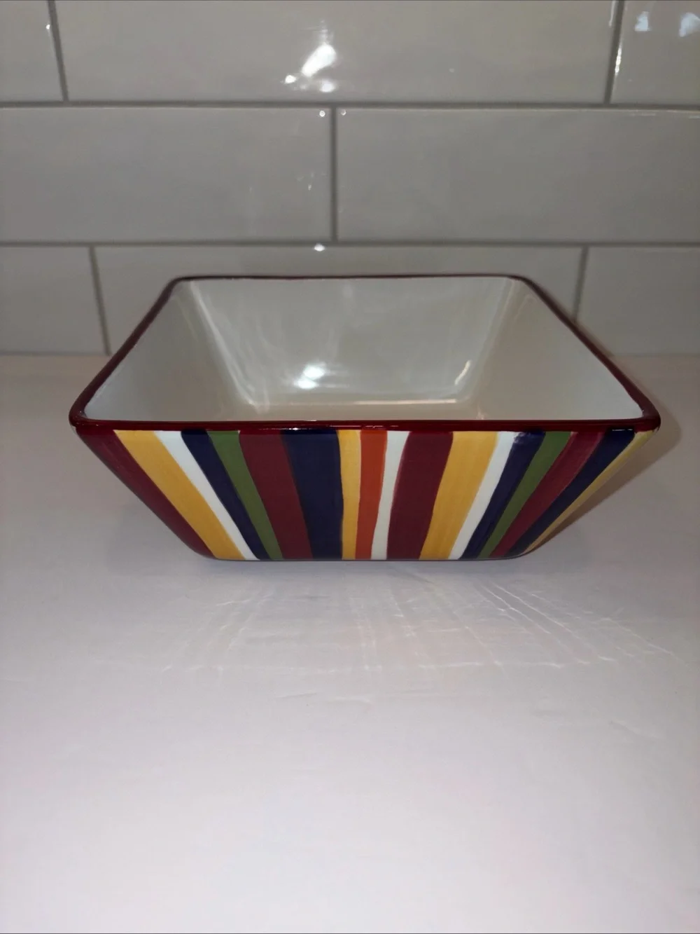 The Pampered Chef Square Ceramic Dish with Red and Multicolor Stripe Trim